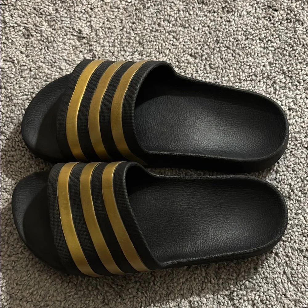adidas Black Slide Sandals with Metallic Gold Stripes